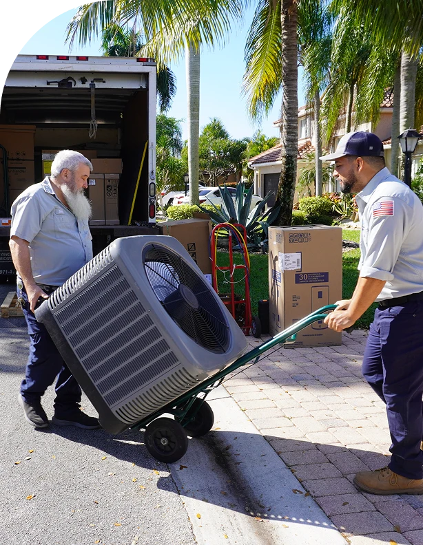 AC technician in Boca Raton carting in new AC